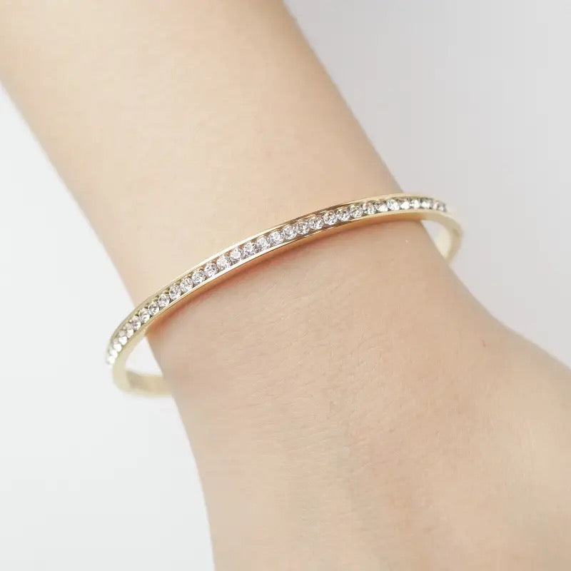 Gold Channel Set Tennis Bangle