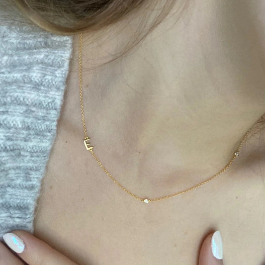 Gold 3 Stone Sideswept Initial Necklace