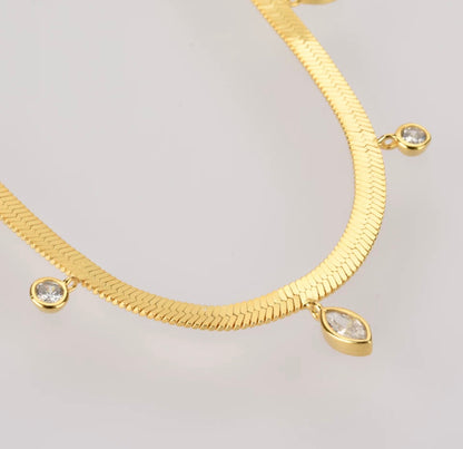 Gold Charmed Herringbone Necklace