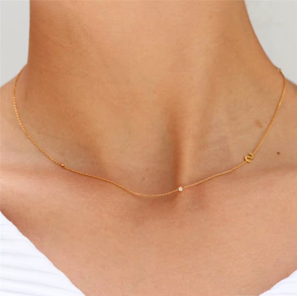 Gold 3 Stone Sideswept Initial Necklace