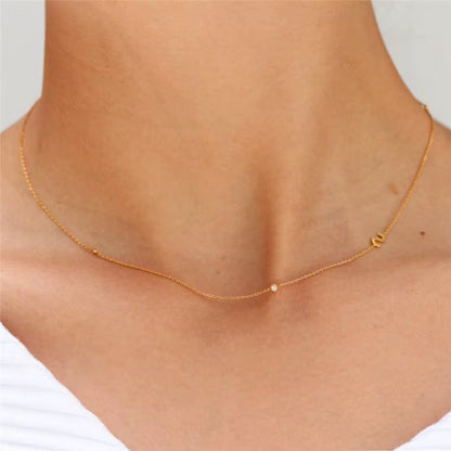 Gold 3 Stone Sideswept Initial Necklace