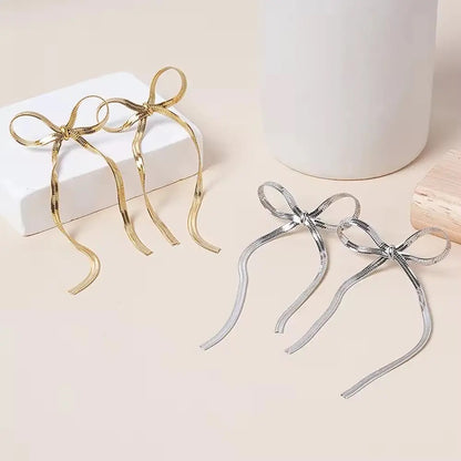 Glamour Bow Statement Earring (Gold, Silver)